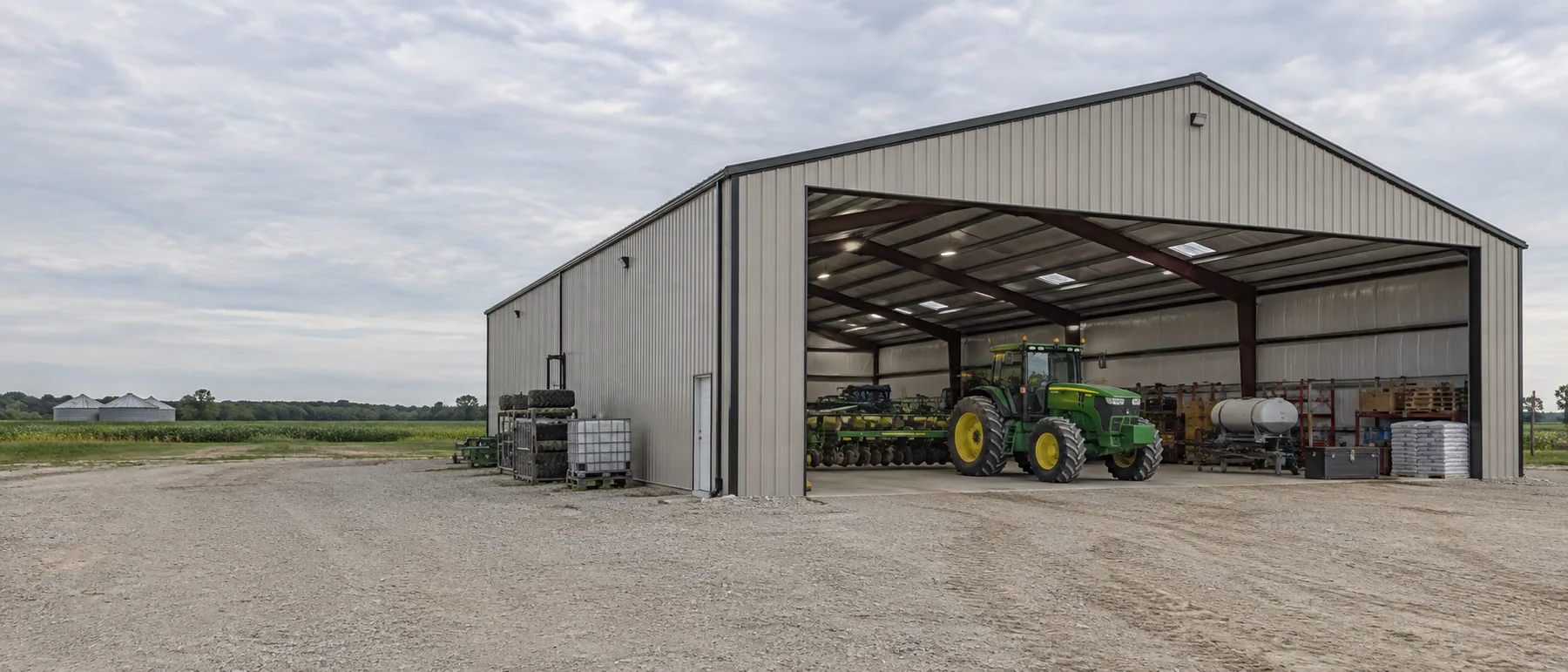Agricultural steel building with farm equipment